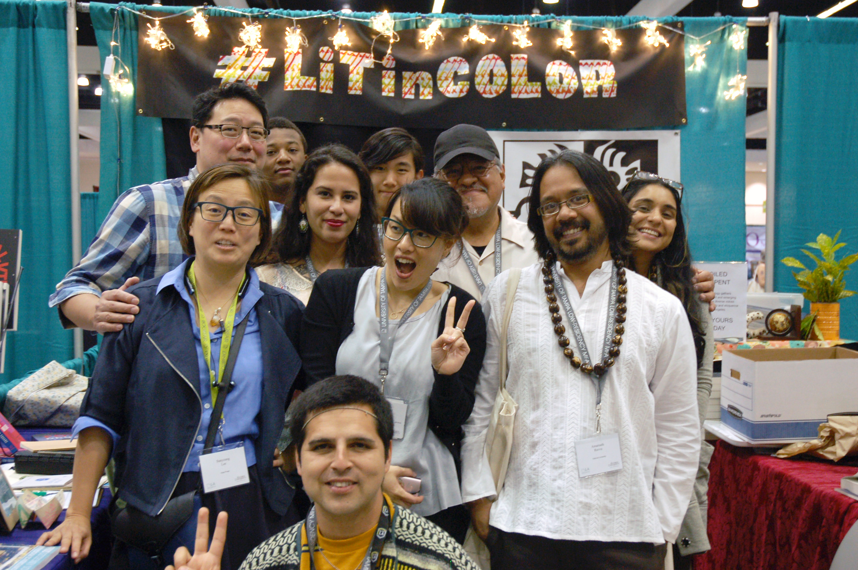 Kaya Press editors and authors in their booth at AWP