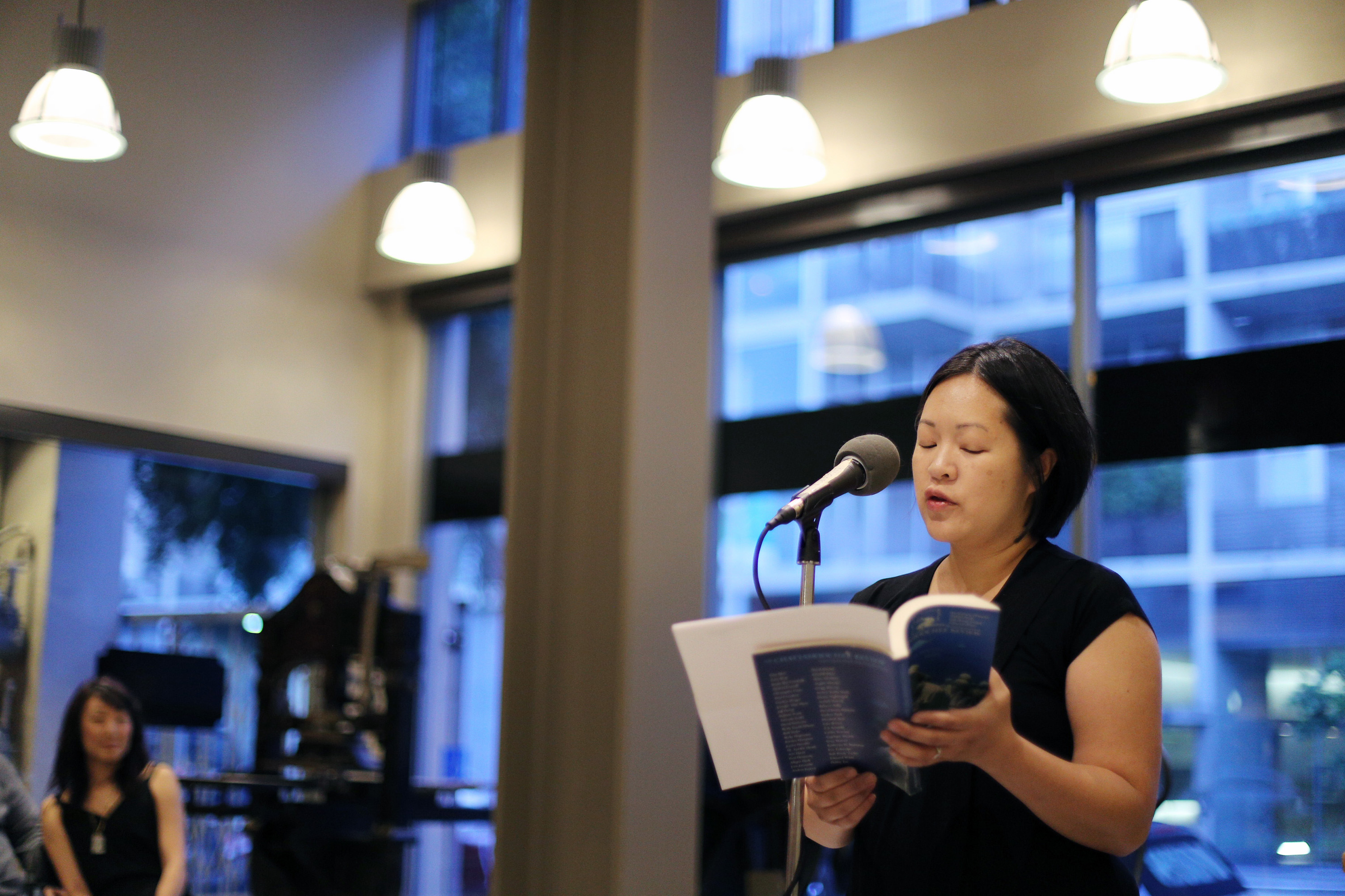 Debbie Yee reads at the American Bookbinders Museum after meditating on the image of the body as book.